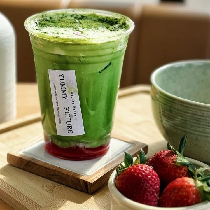 Strawberry Matcha Duo on a wooden board with fresh strawberries